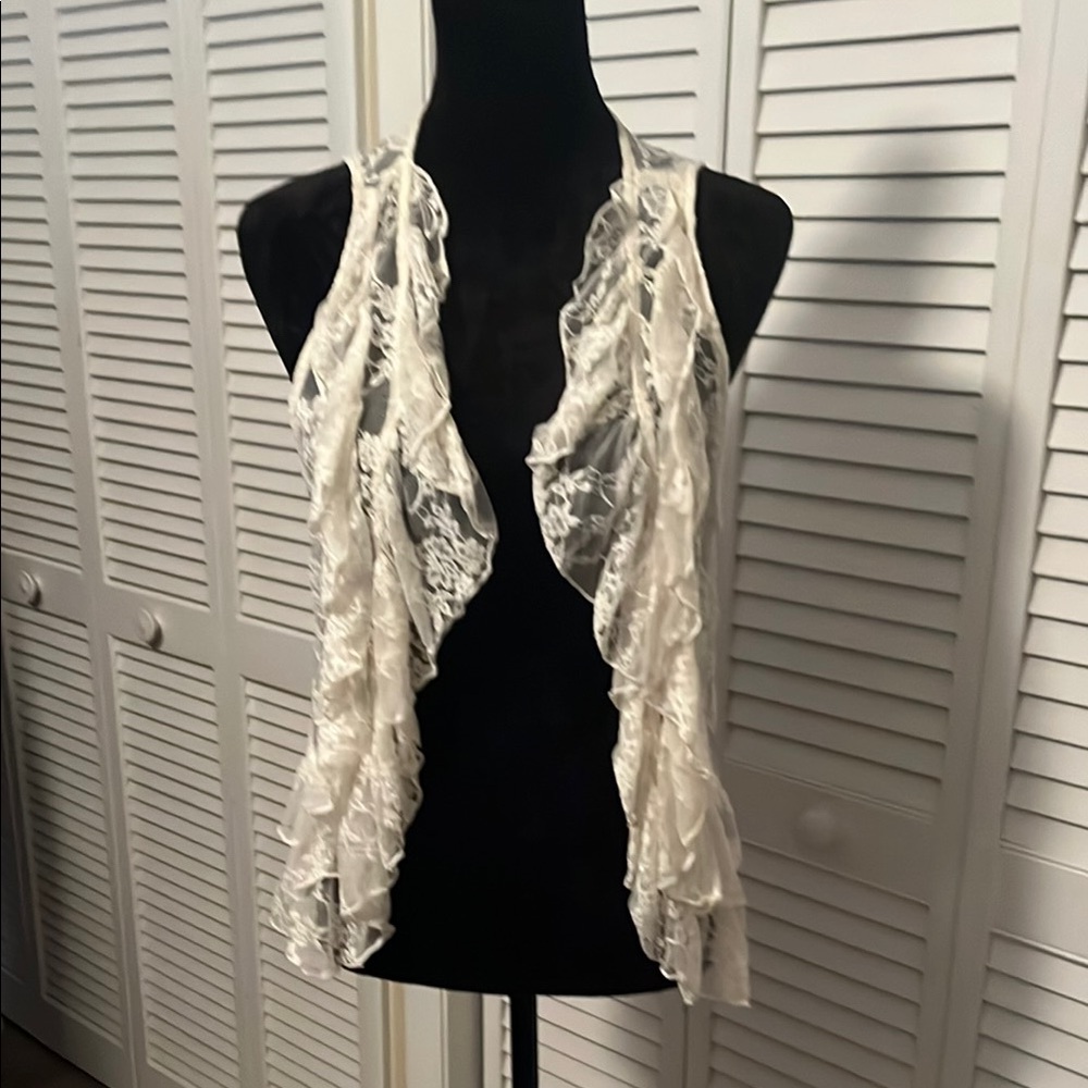 Cream & Black Ruffled Sleeveless Vests with Waterfall Design..buy both for $30
